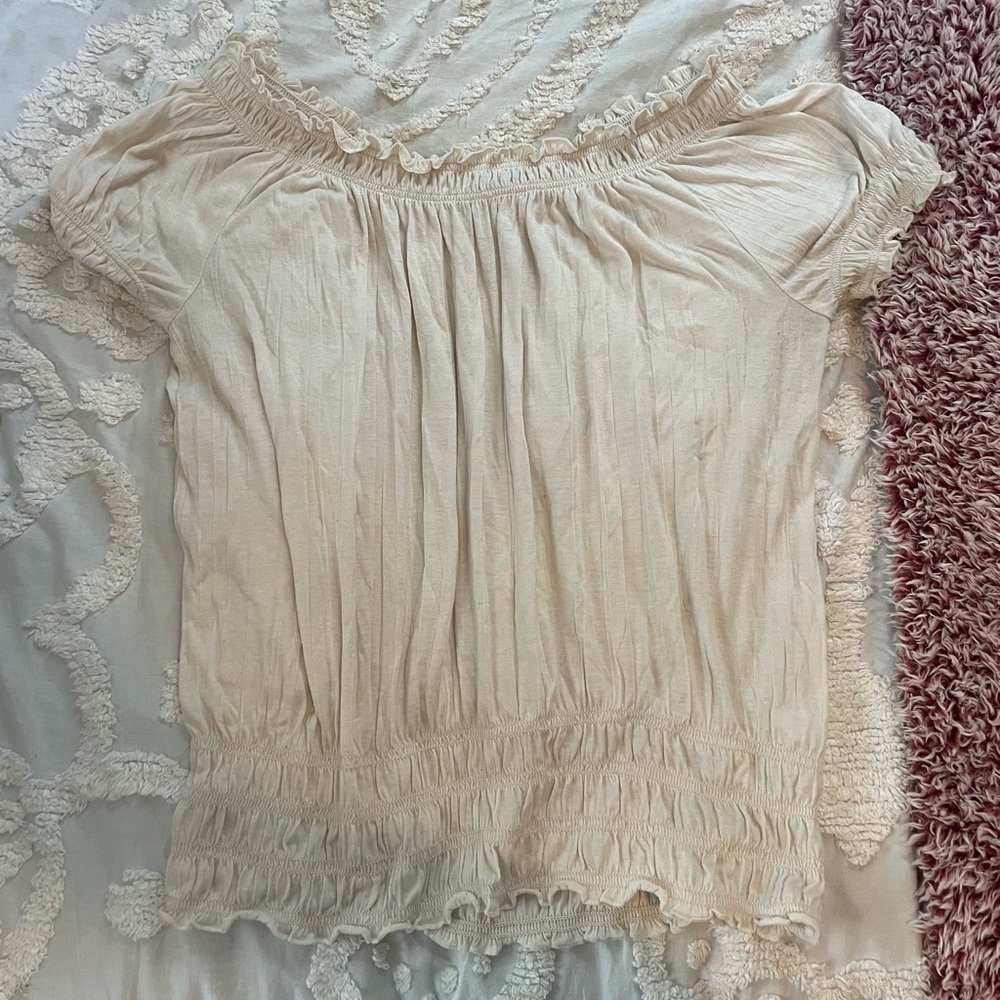 Cream ruffled top